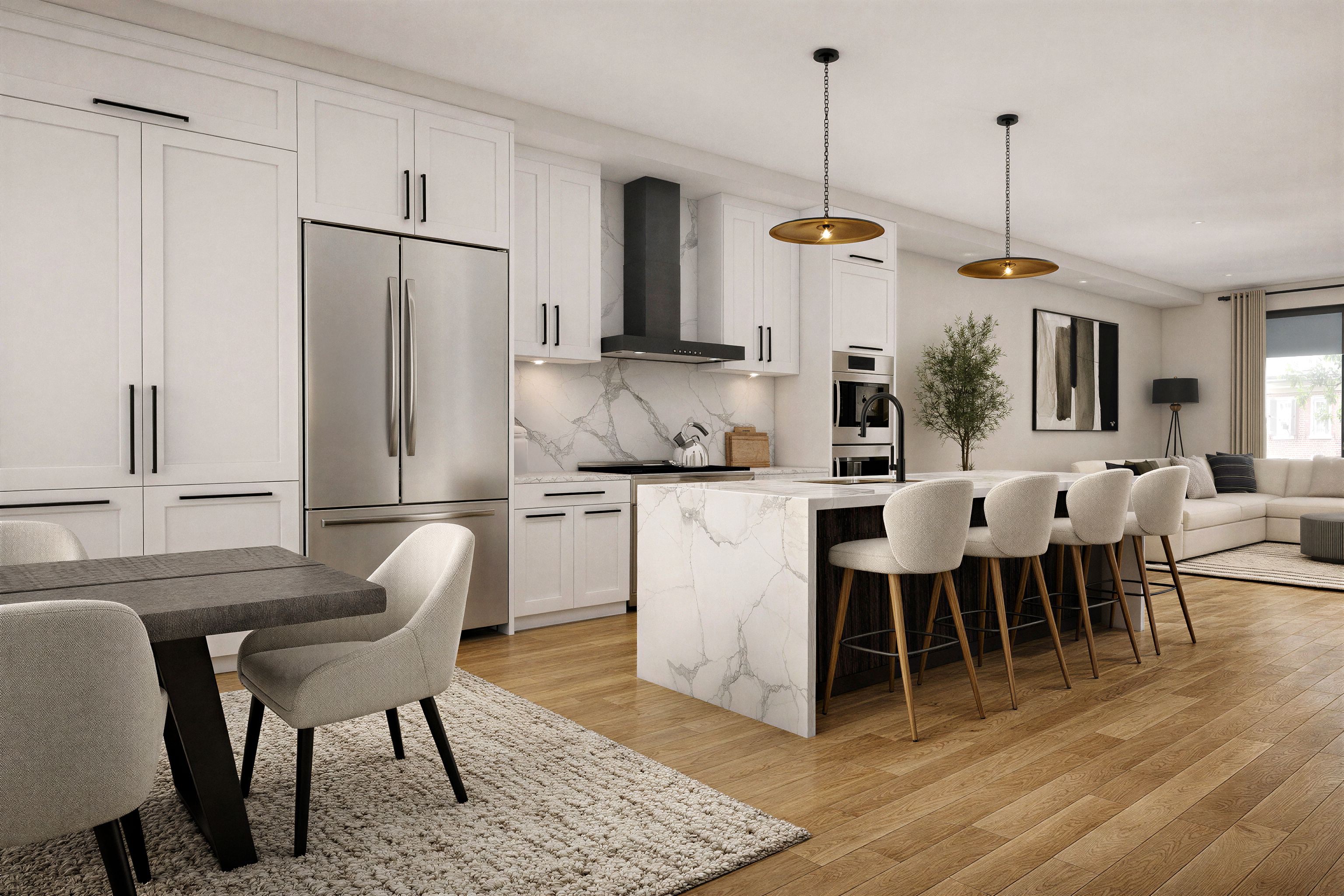 New build open kitchen with white cabinetry, a marble waterfall island and counter stools, brass pendants, and the living area beyond.