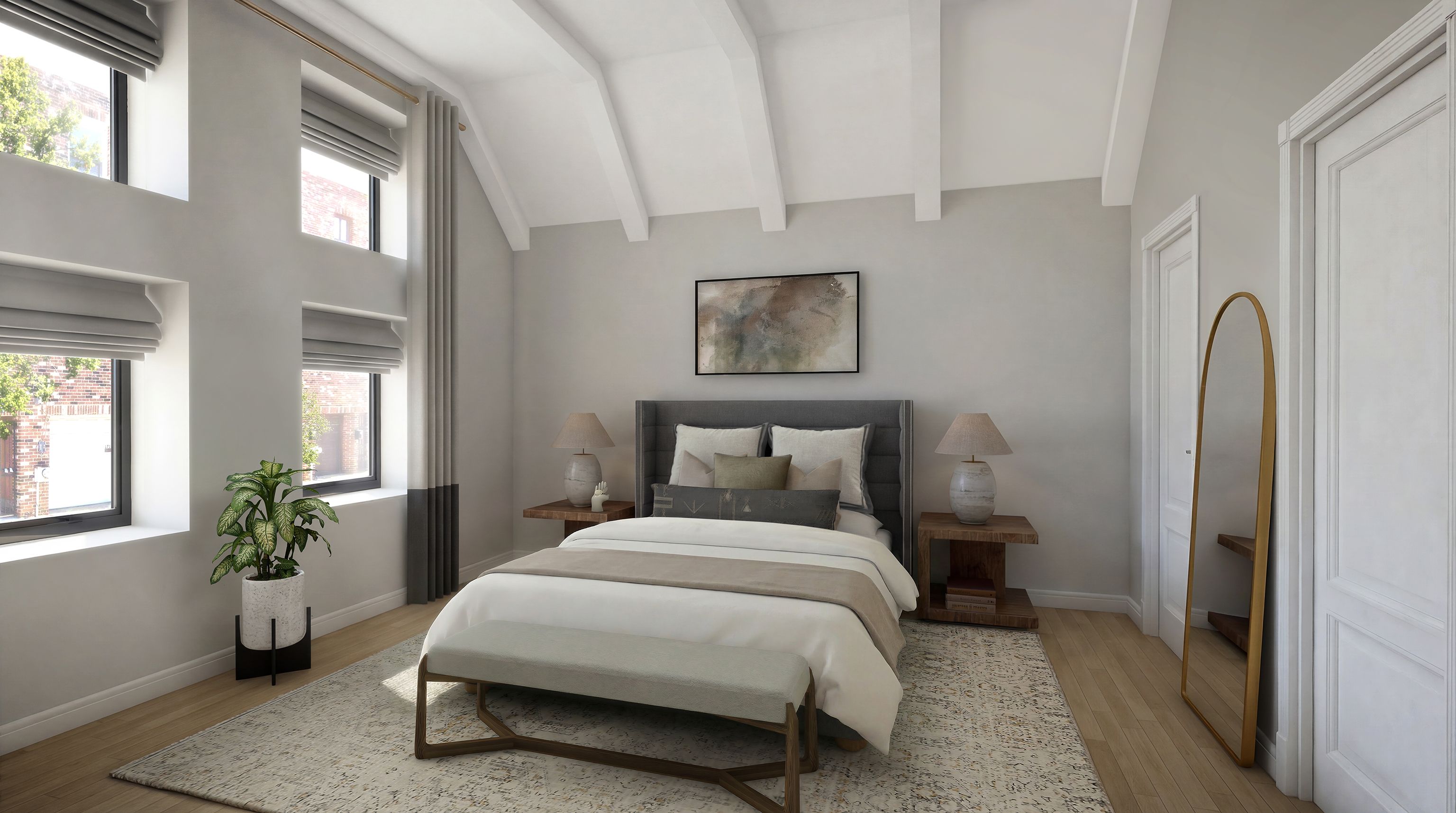 Contemporary primary bedroom with an upholstered bed and bench positioned between tall windows beneath a vaulted ceiling.