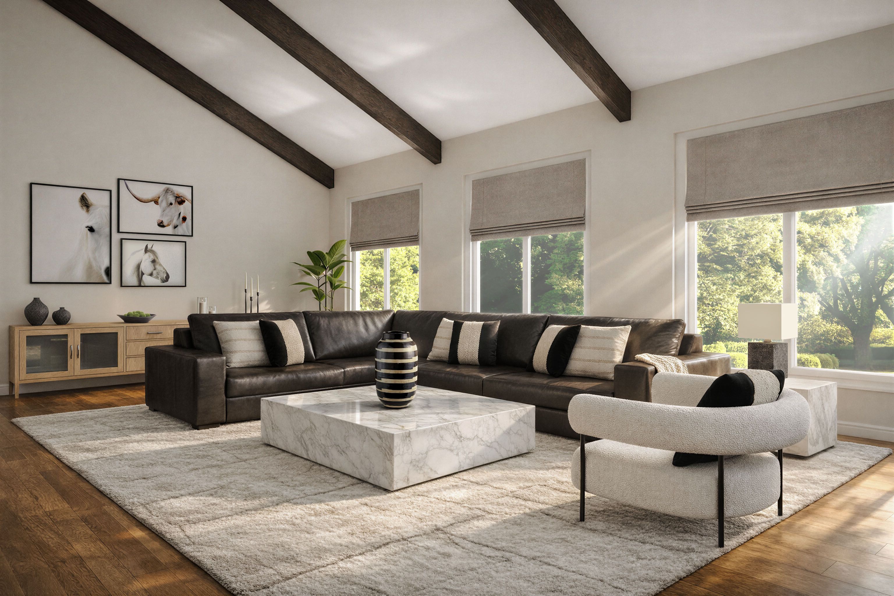 Family room with exposed ceiling beams, a dark leather sectional, a marble coffee table and a textured cream wool rug.